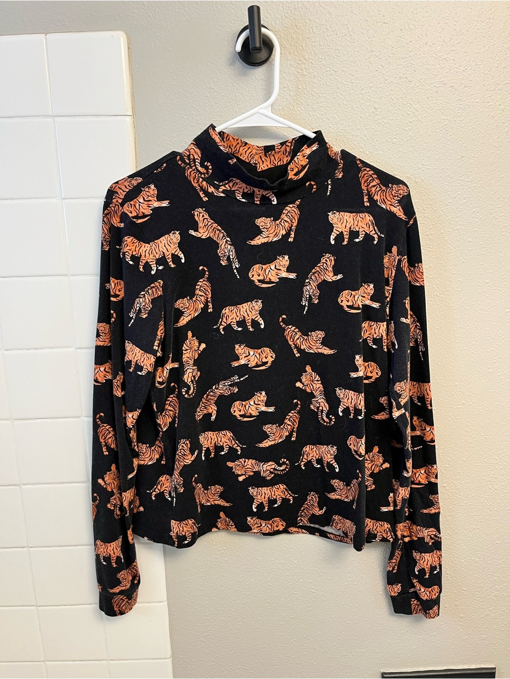 Anthropologie Black Long-Sleeve Mock Neck with Orange Tiger Print